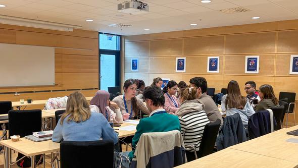 Doctoral candidates working in groups at the Department of Biomaterials, University of Gothenburg, during hands on training in r